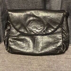 Vintage Carlos Falchi crossbody purse, Black leather with appliqué logo.